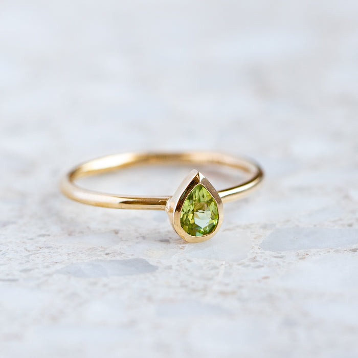 Pear shaped store peridot ring